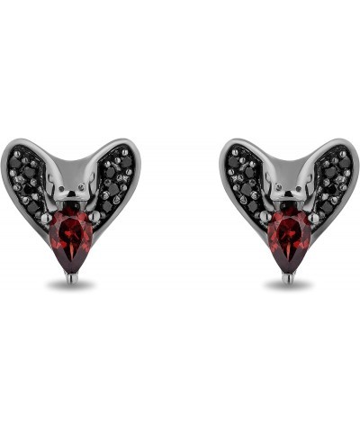 Enchanted Disney Fine Jewelry Black Rhodium over Sterling Silver 5x3 MM Pear Red Garnet and 1/8 Cttw Treated Black Round Diam...